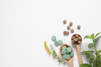 Photo of Different pills and herbs on white background, flat lay with space for text. Dietary supplements