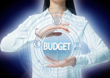 Budget management. Businesswoman demonstrating virtual scheme with different financial icons on blue background, closeup