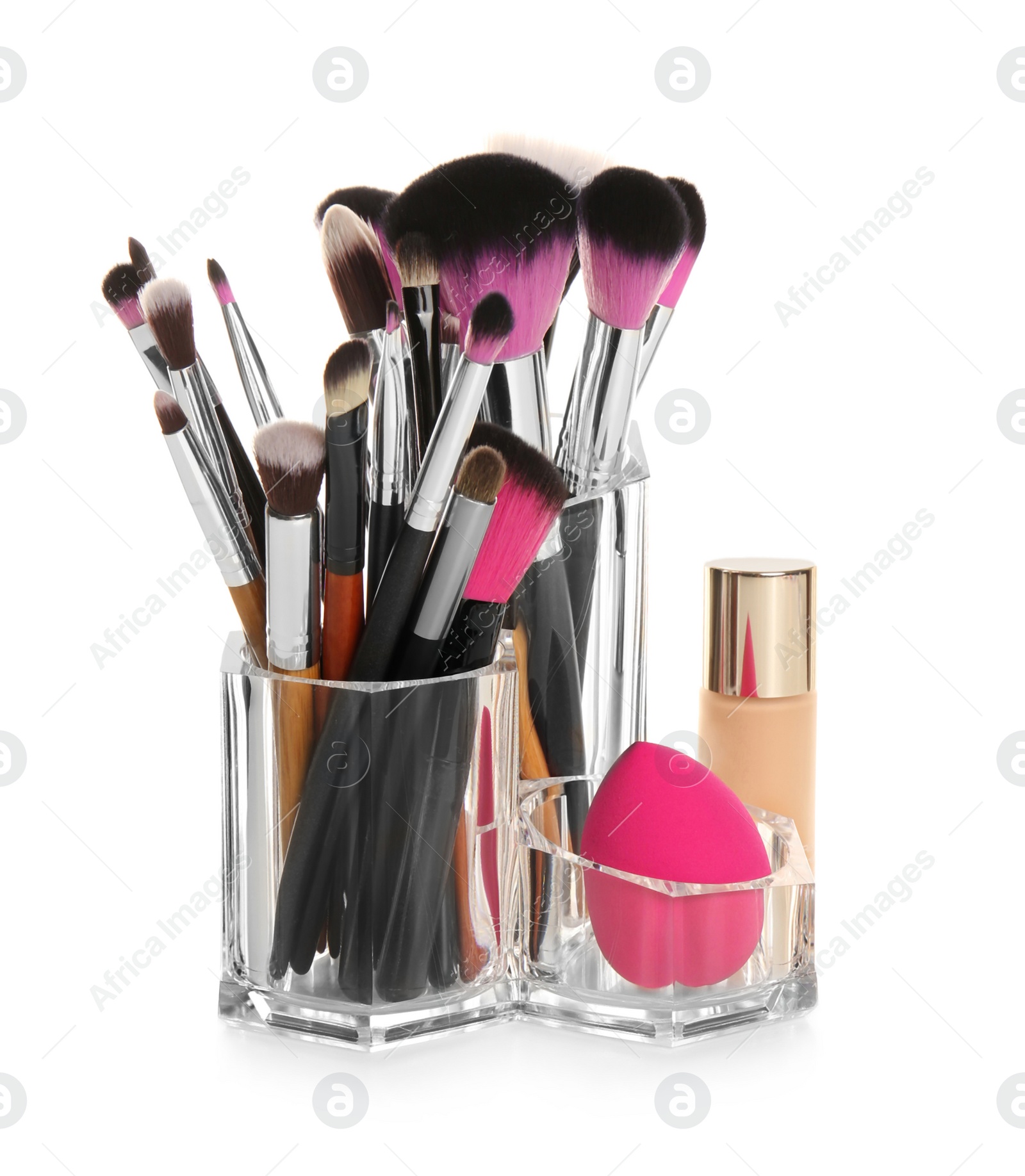 Photo of Set of makeup cosmetic products in organizer on white background