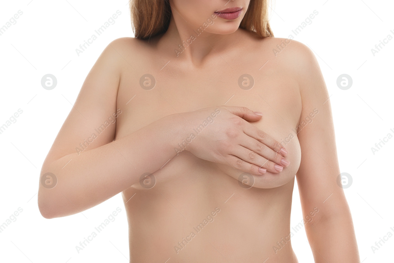 Photo of Mammology. Naked young woman doing breast self-examination on white background, closeup