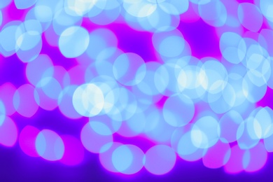 Photo of Beautiful glowing lights as background. Bokeh effect