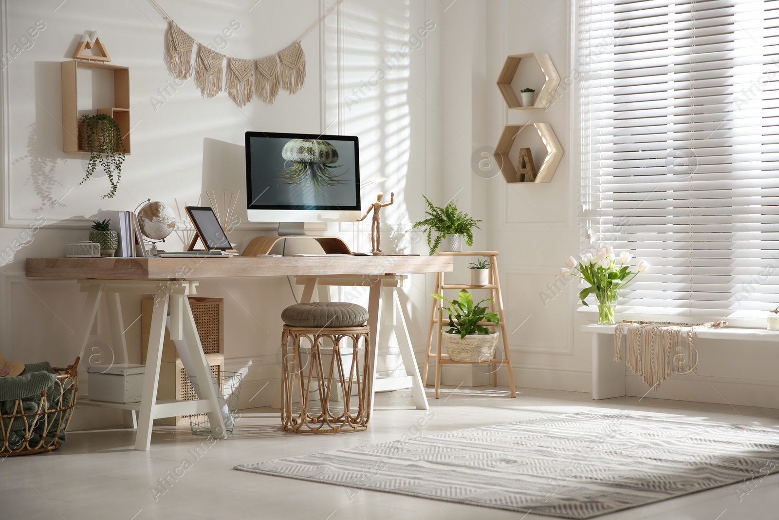 Photo of Stylish home office interior with comfortable workplace