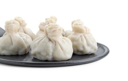 Serving board with tasty fresh khinkali (dumplings) isolated on white. Georgian cuisine