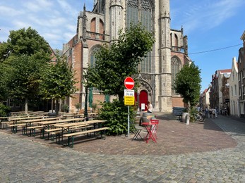 Leiden, Netherlands - August 28, 2022; Beautiful view of Hooglandse Kerk and trees on sunny day