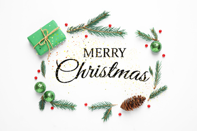 Image of Flat lay composition with text MERRY CHRISTMAS and natural decor on white background
