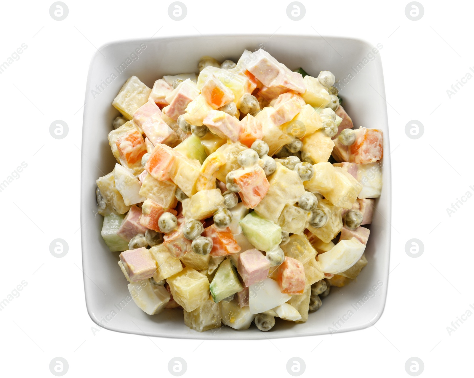 Photo of Delicious russian salad Olivier on white background, top view