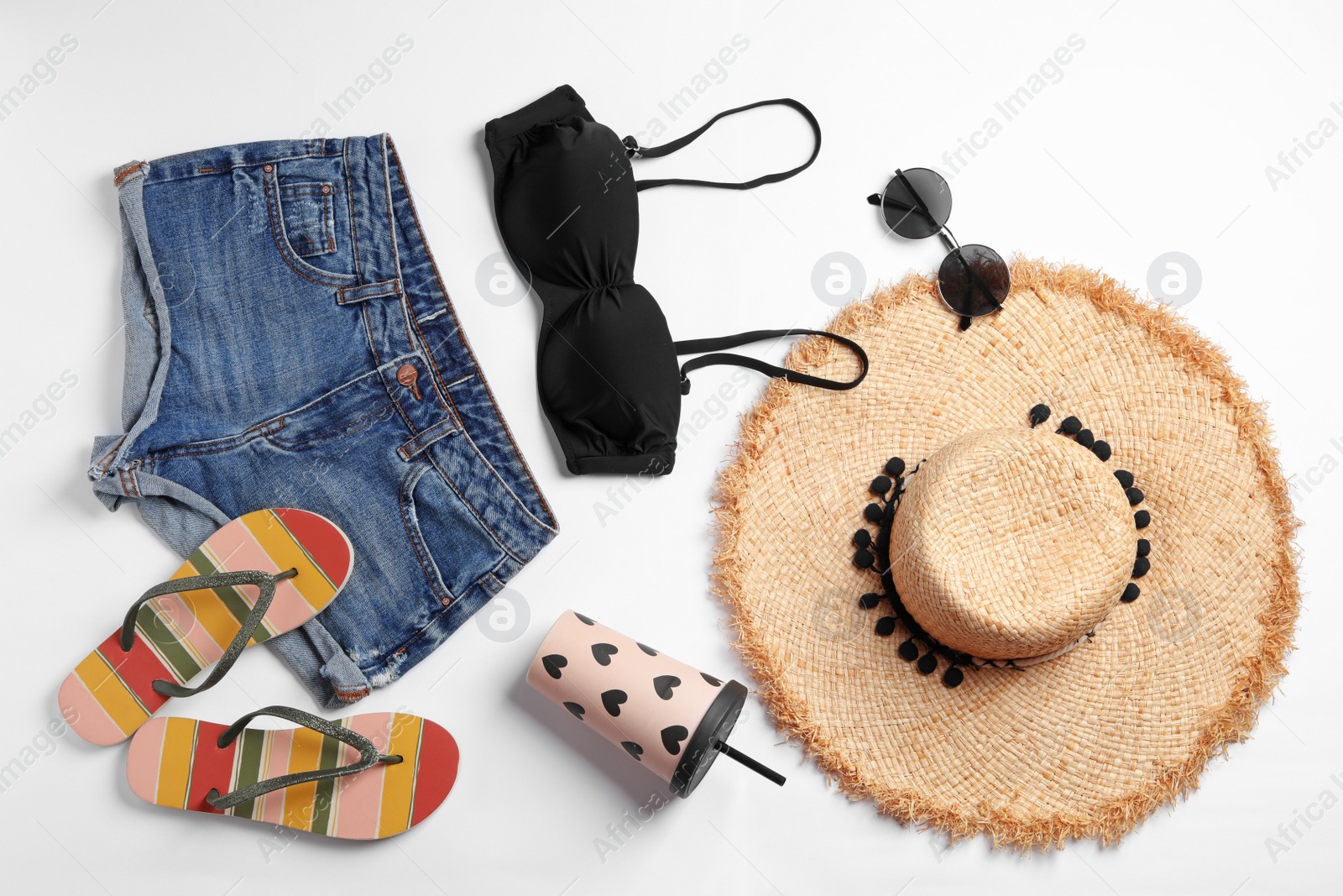 Photo of Flat lay composition with stylish beach accessories on white background