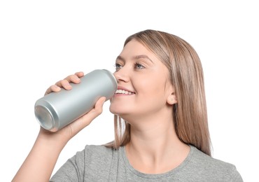 Beautiful happy woman drinking from beverage can on white background