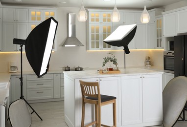 Professional photo studio equipment prepared for shooting kitchen interior