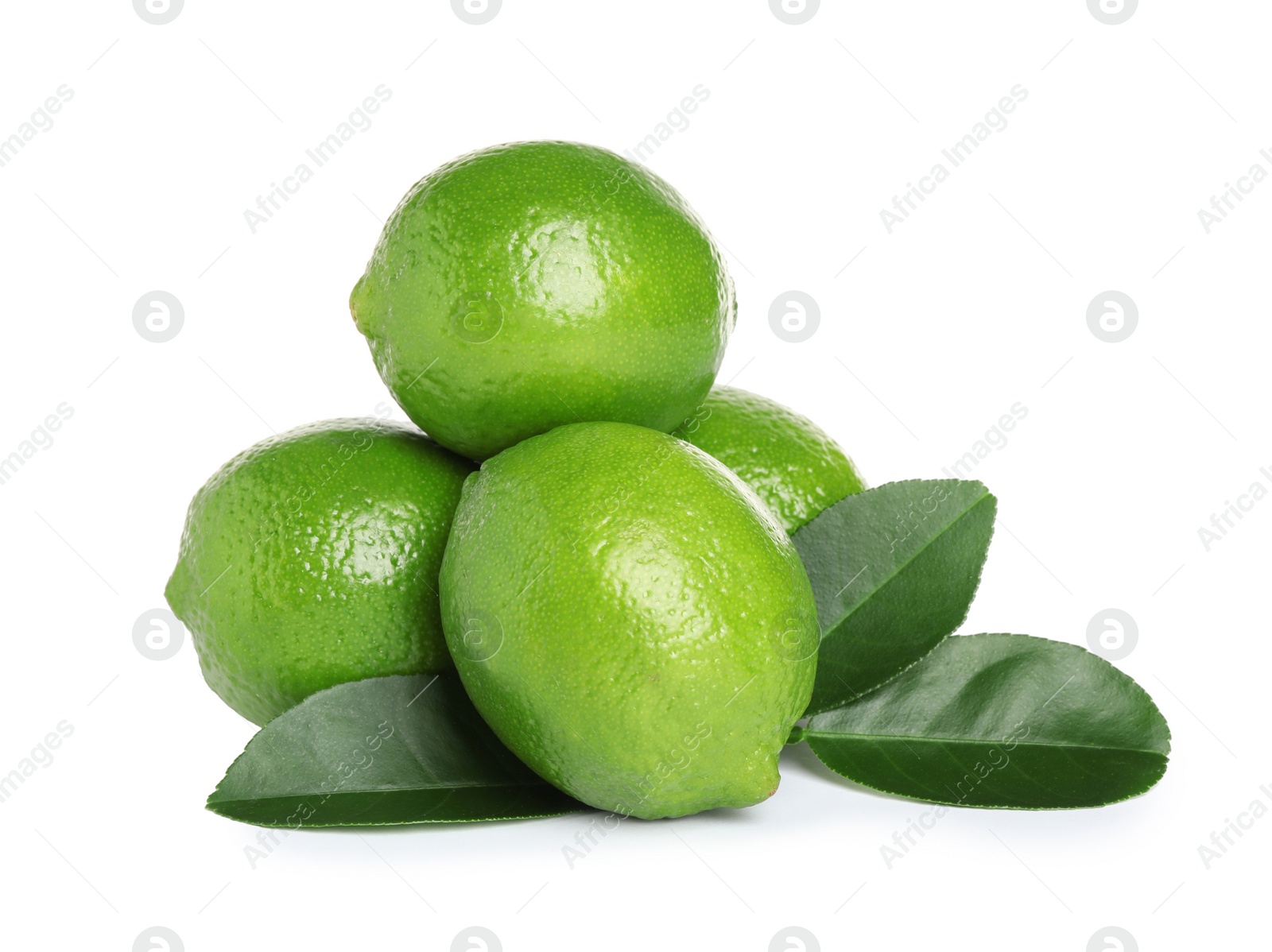 Photo of Fresh ripe limes with green leaves isolated on white