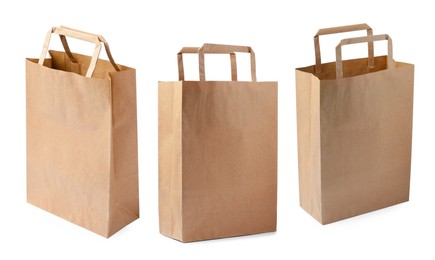 Set with kraft paper bags on white background