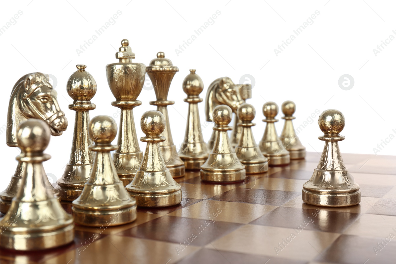 Photo of Pawn in front of other chess pieces on wooden board against white background