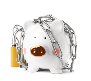 Photo of Piggy bank with steel chain and padlock isolated on white. Money safety concept
