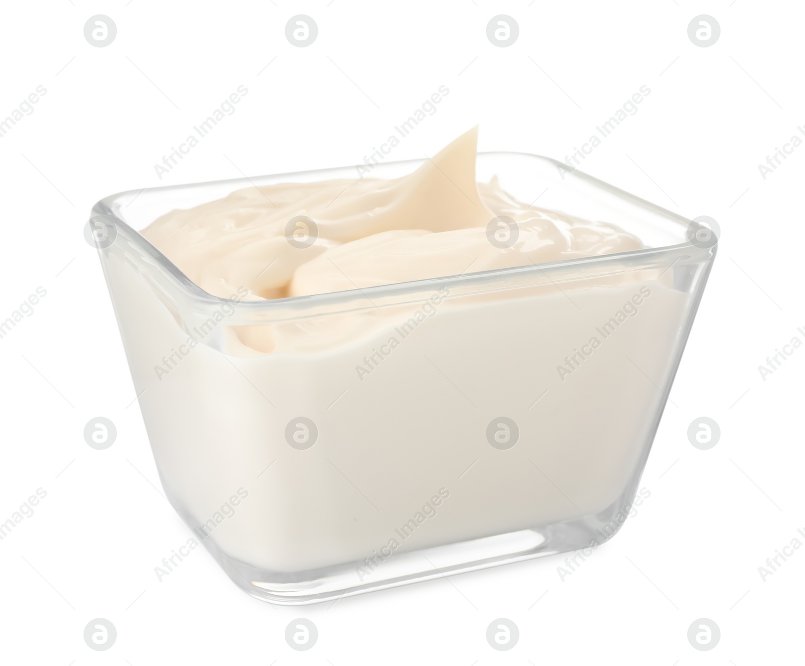 Photo of Mayonnaise in glass bowl isolated on white