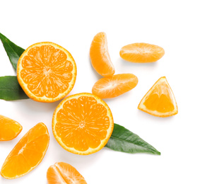 Photo of Composition with fresh ripe tangerines and leaves on white background, flat lay. Citrus fruit