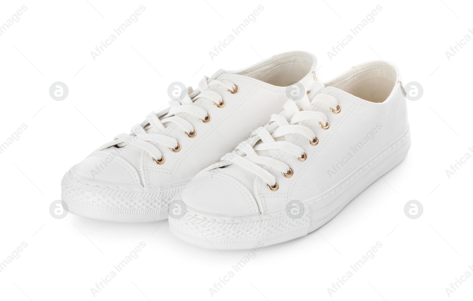 Photo of Pair of stylish sneakers on white background