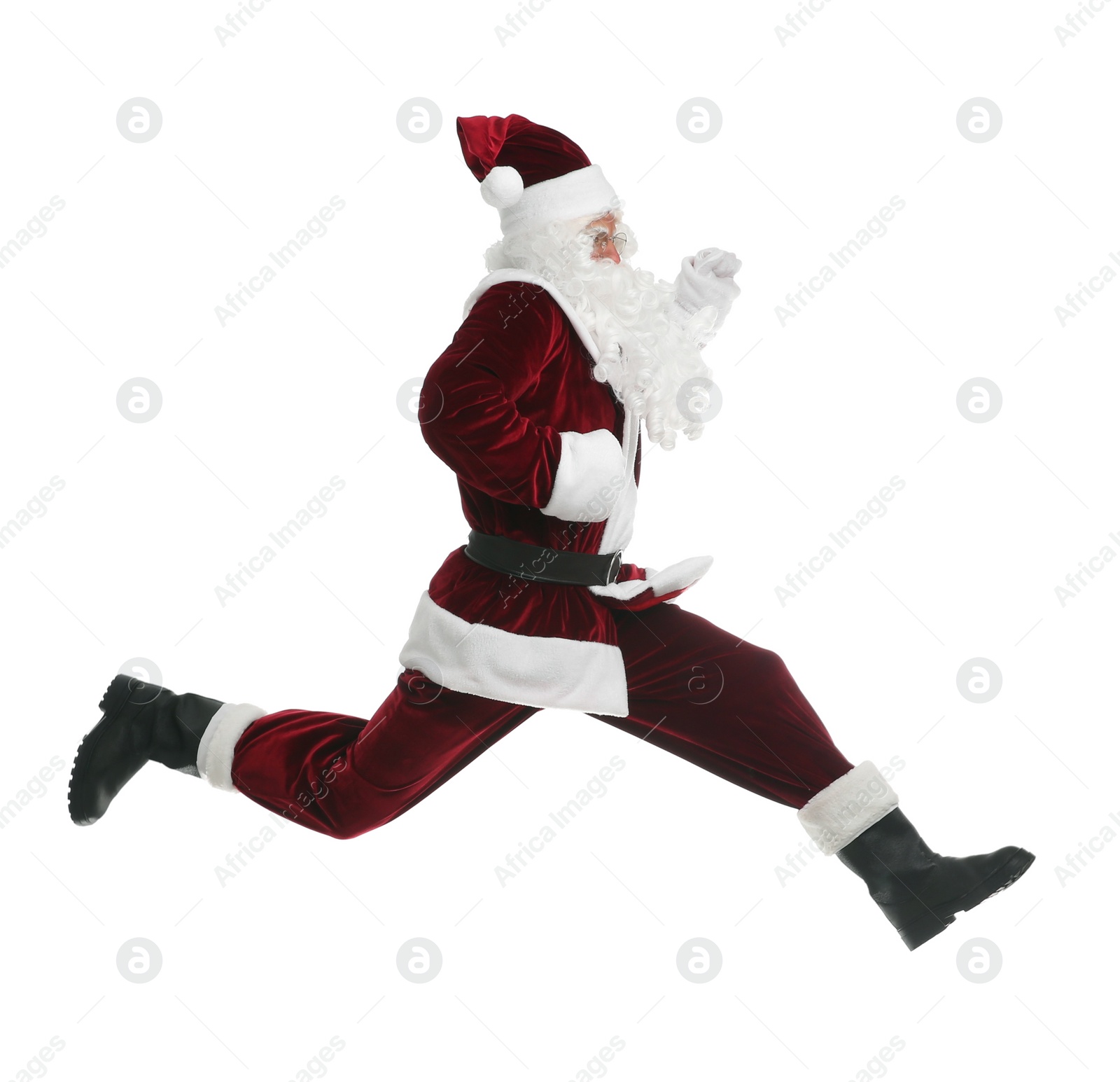 Photo of Santa Claus in red costume jumping on white background