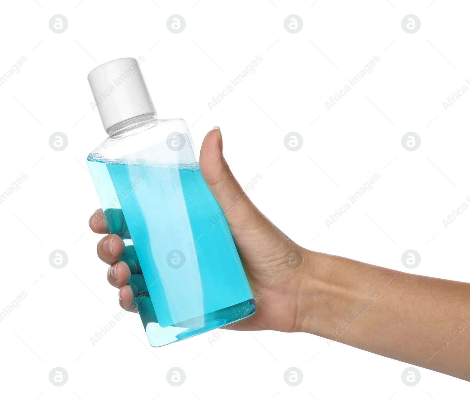 Photo of Woman holding bottle with mouthwash for teeth care on white background