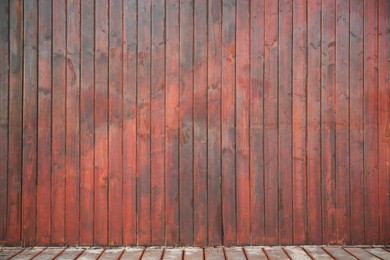 Photo of View on urban wooden wall and floor
