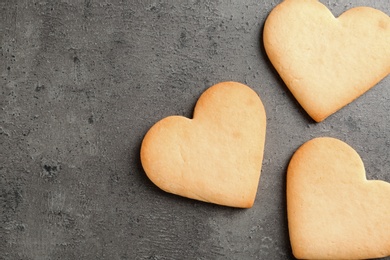 Photo of Homemade heart shaped cookies and space for text on table, top view