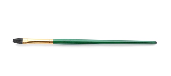 Photo of Brush for painting on white background. School stationery