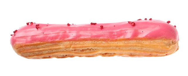 Photo of Delicious eclair covered with pink glaze isolated on white