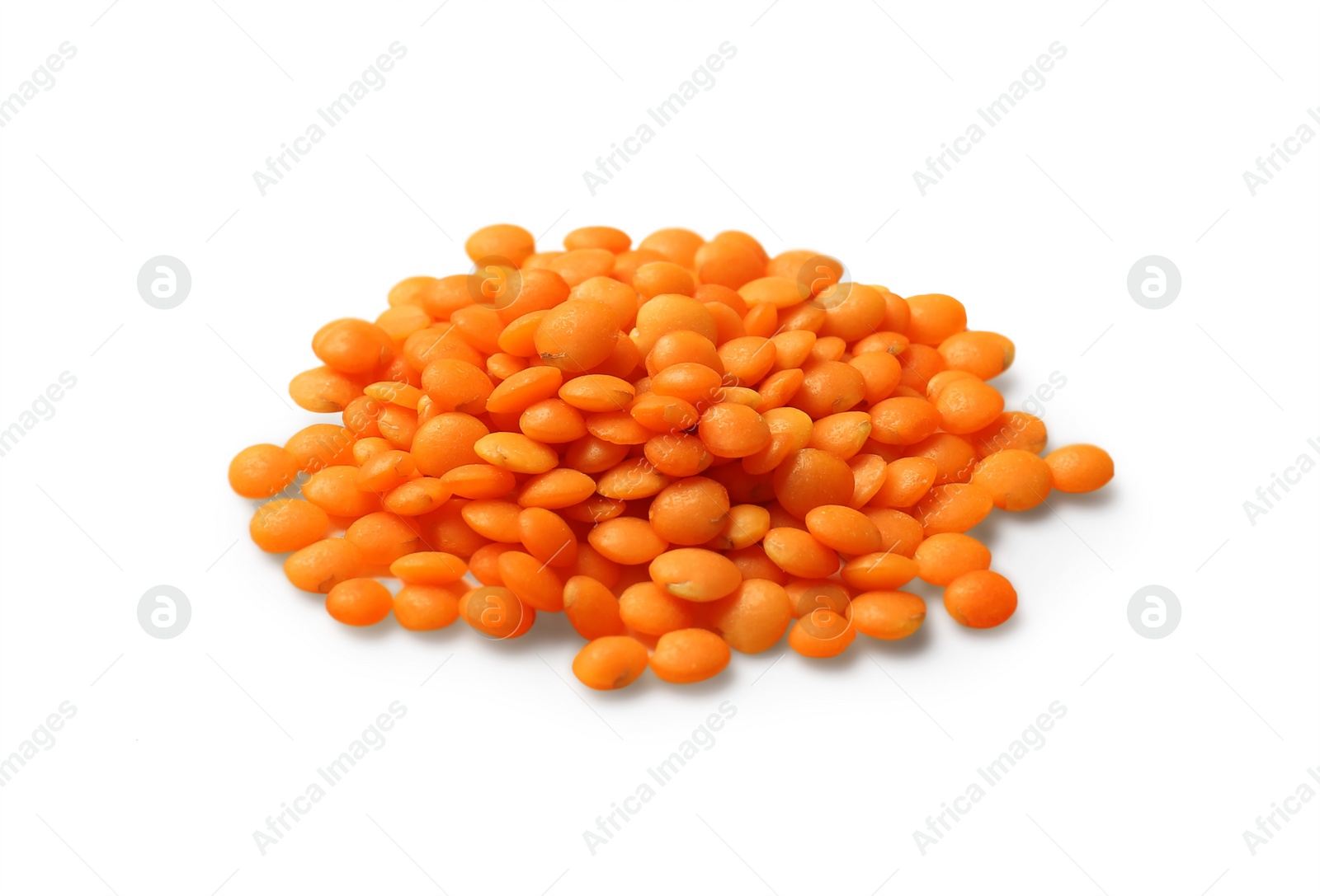 Photo of Pile of raw red lentils isolated on white