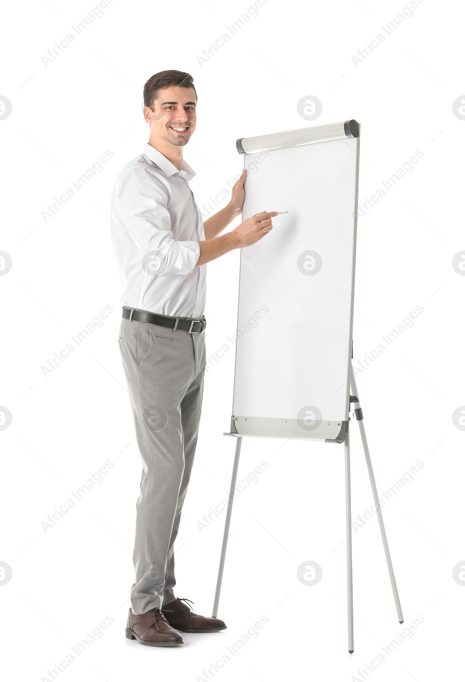 Photo of Business trainer giving presentation on flip chart board against white background