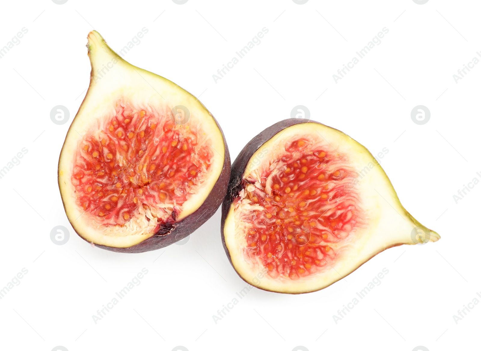 Photo of Halves of tasty fresh fig on white background, top view