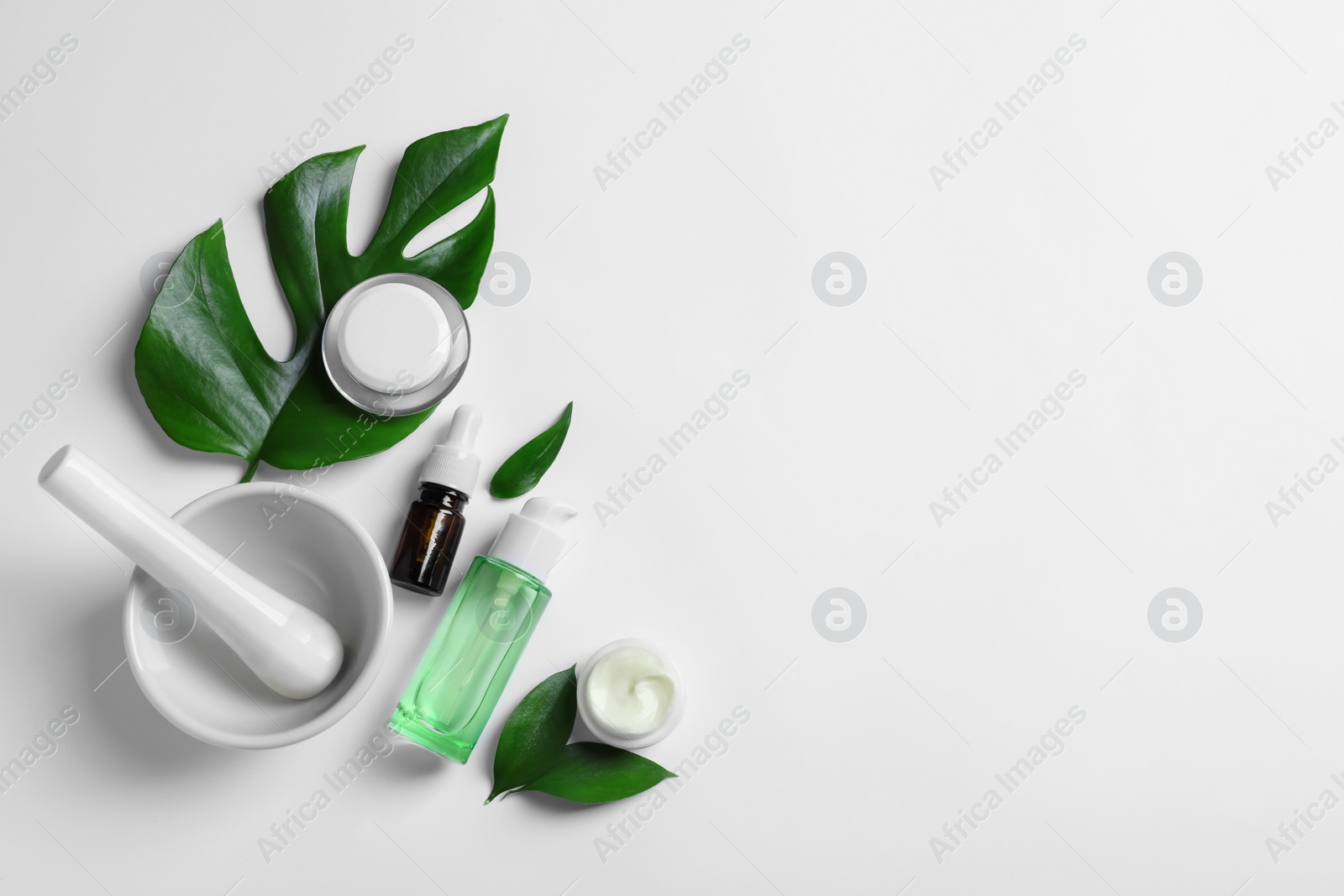 Photo of Flat lay composition with cosmetic products on white background