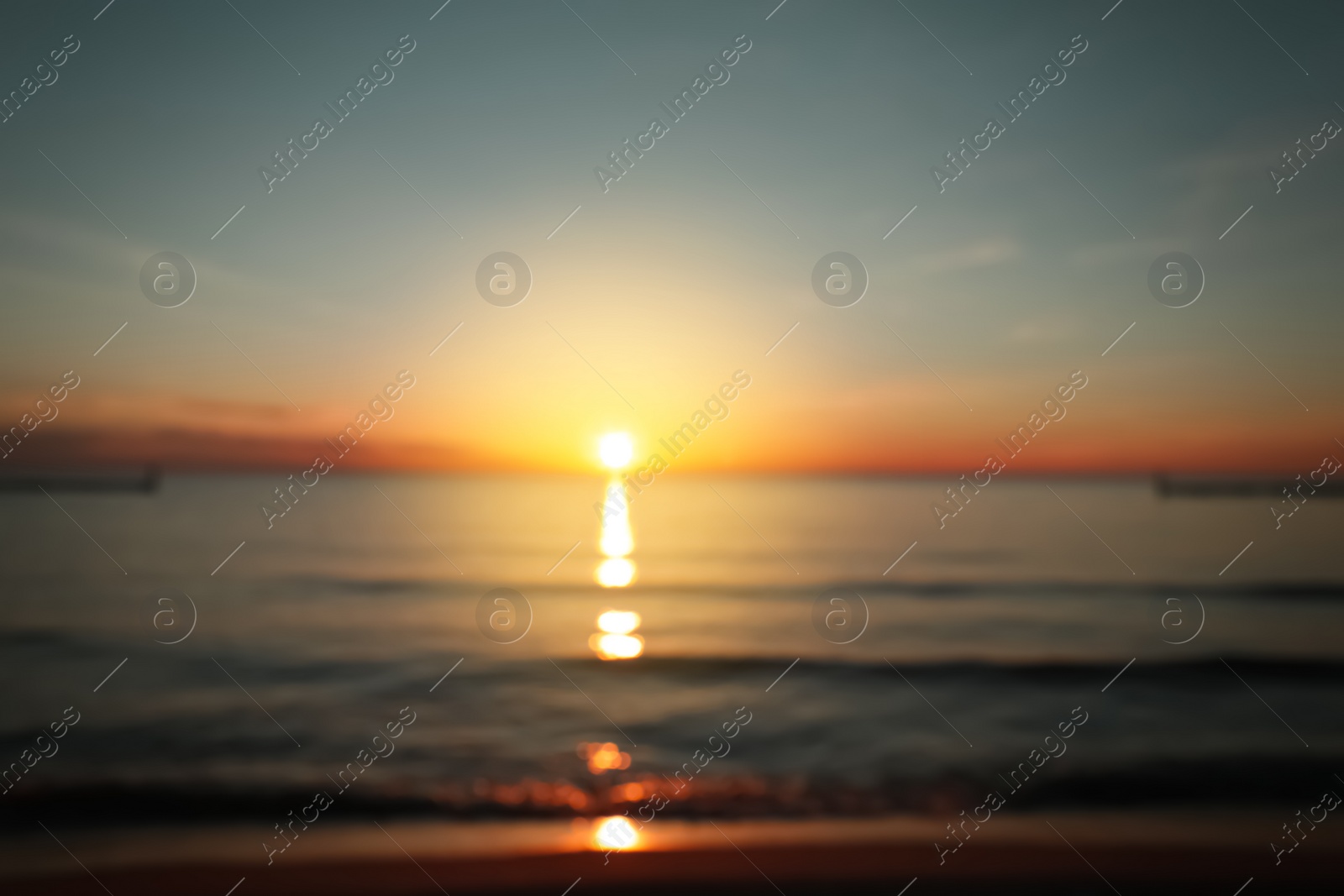 Blurred view of beautiful sea beach at sunset Photo of Blurred view of beautiful sea beach at sunset