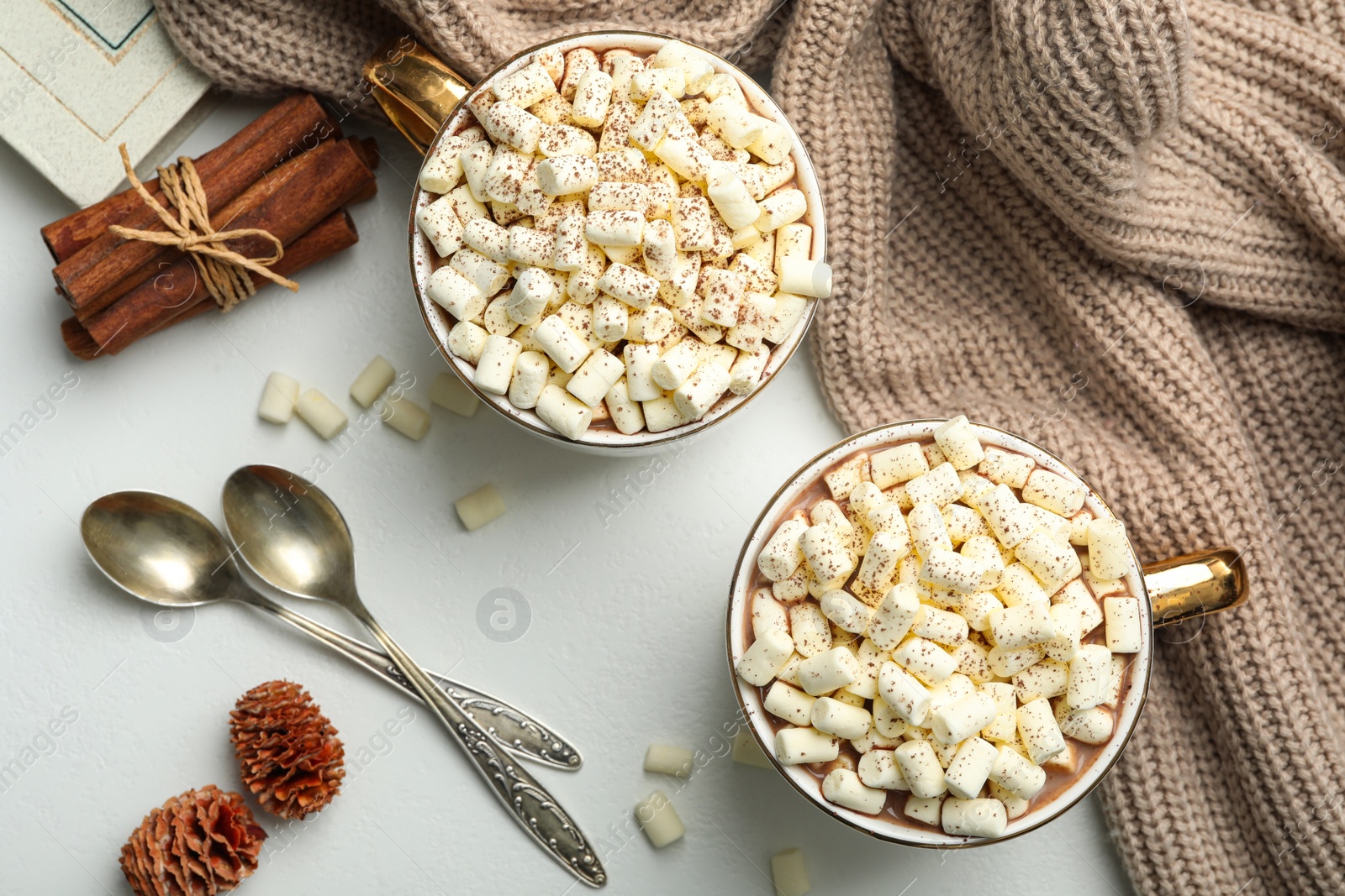 Photo of Flat lay composition with delicious cocoa drink on white table