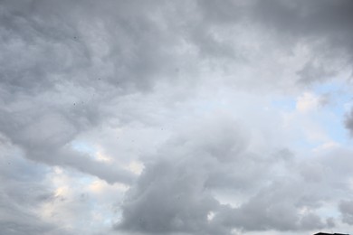 Photo of Picturesque view of sky with heavy rainy clouds