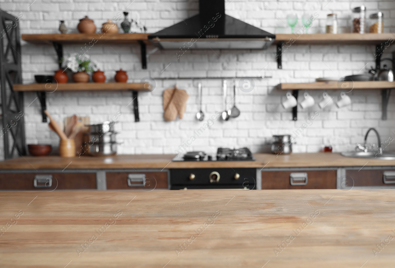 Photo of Empty wooden table in beautiful kitchen. Interior design