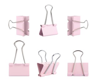 Image of Set with pink binder clips on white background