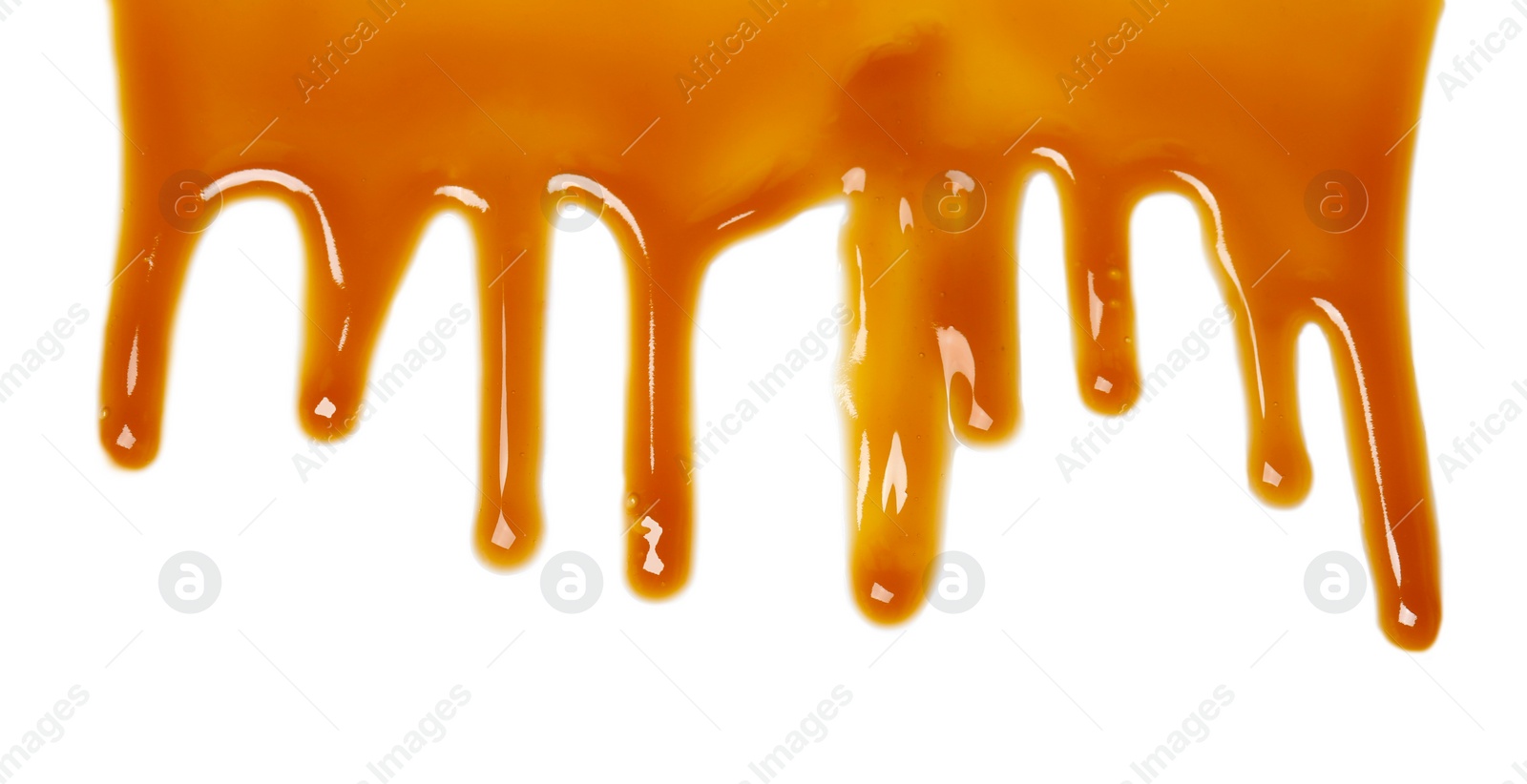 Photo of Delicious caramel sauce on white background