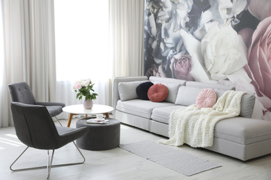 Photo of Modern living room interior with comfortable sofa and armchairs