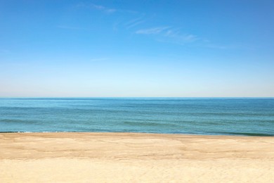 Photo of Picturesque view of sandy beach near sea