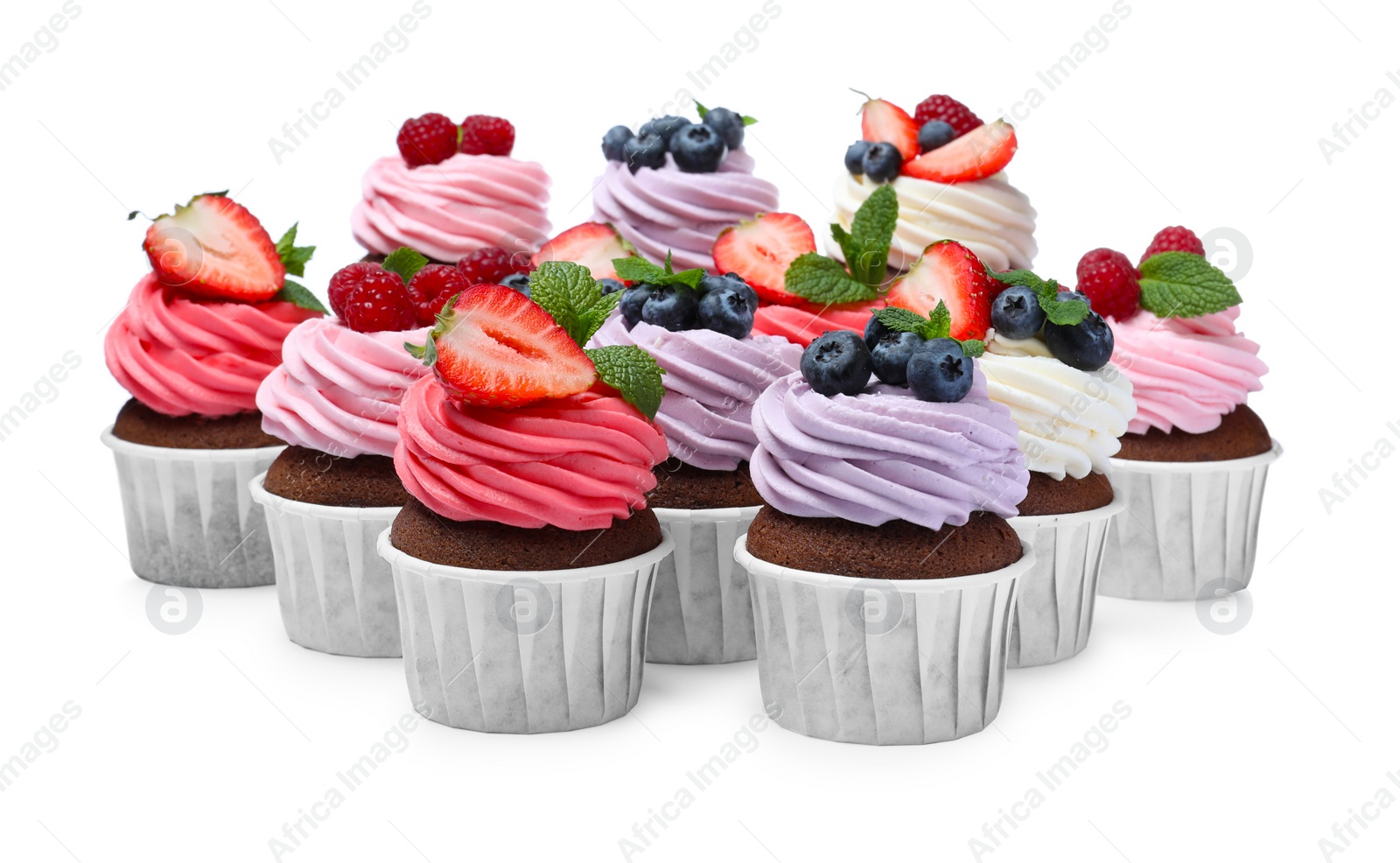Photo of Sweet cupcakes with fresh berries on white background