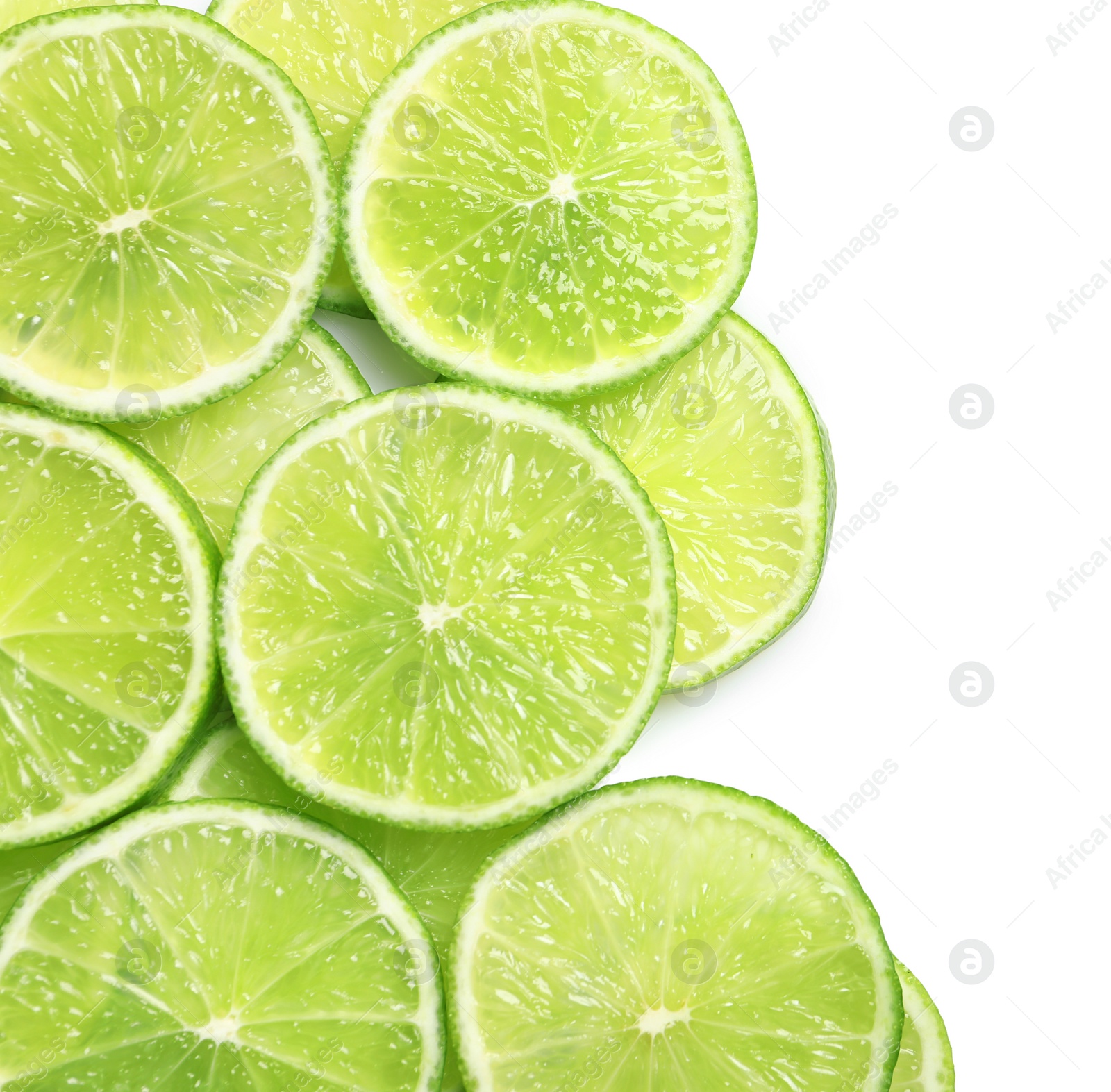 Photo of Fresh sliced ripe limes on white background, top view