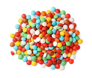 Photo of Many small colorful candies on white background, top view