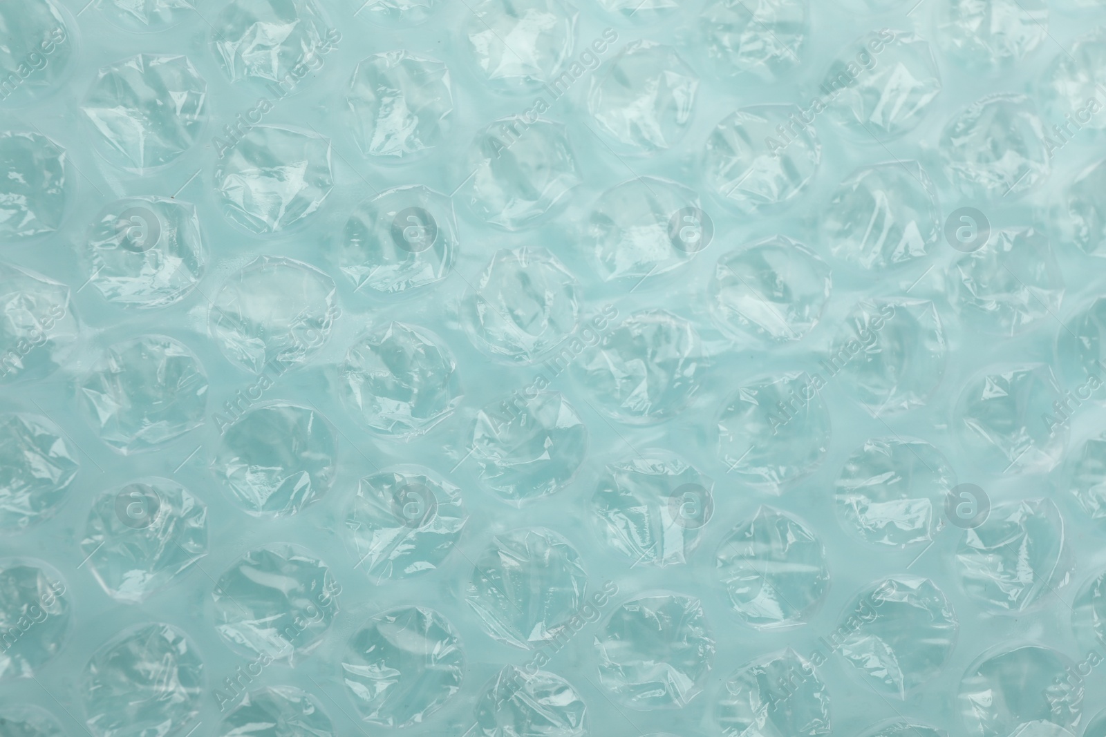 Photo of Texture of bubble wrap as background, top view