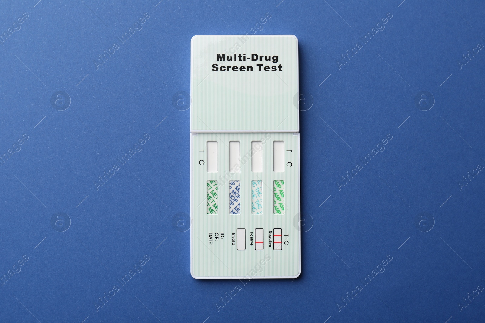 Photo of Multi-drug screen test on blue background, top view