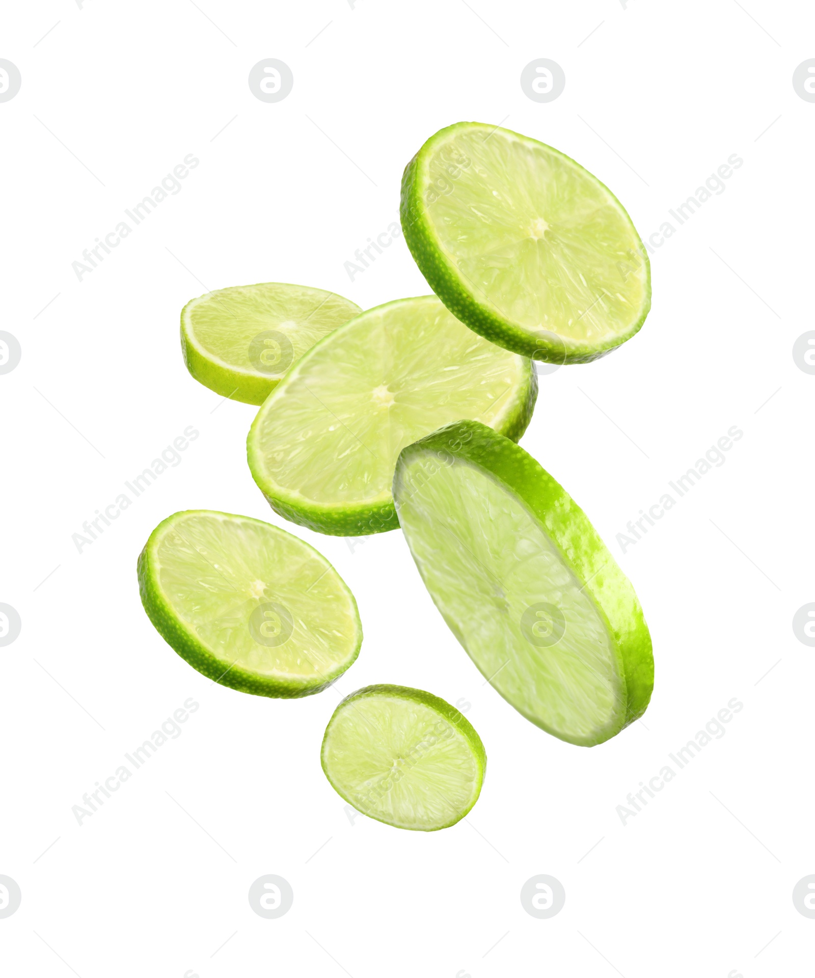 Image of Fresh lime slices falling on white background