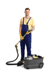 Photo of Male janitor with carpet cleaner on white background