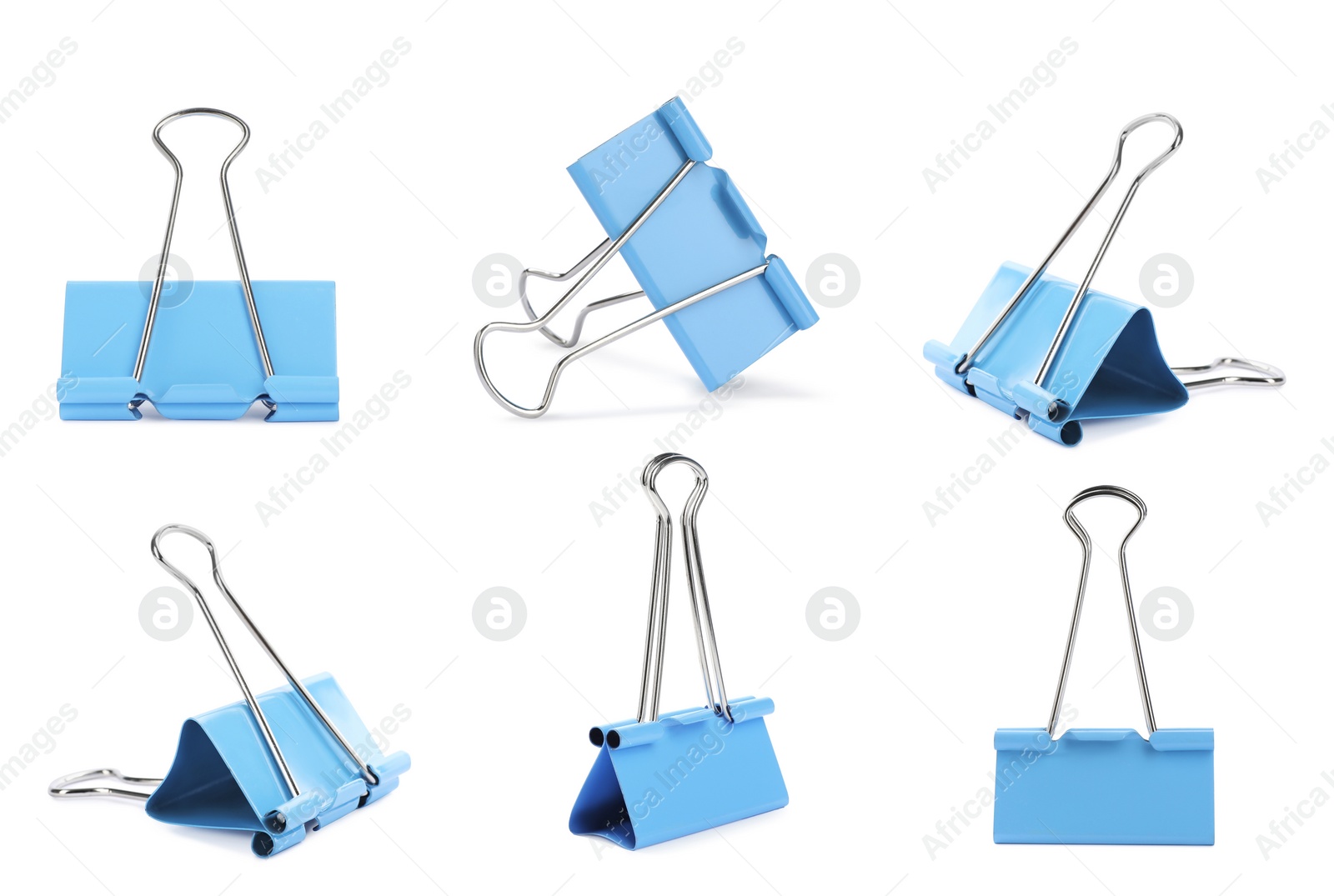 Image of Set with light blue binder clips on white background