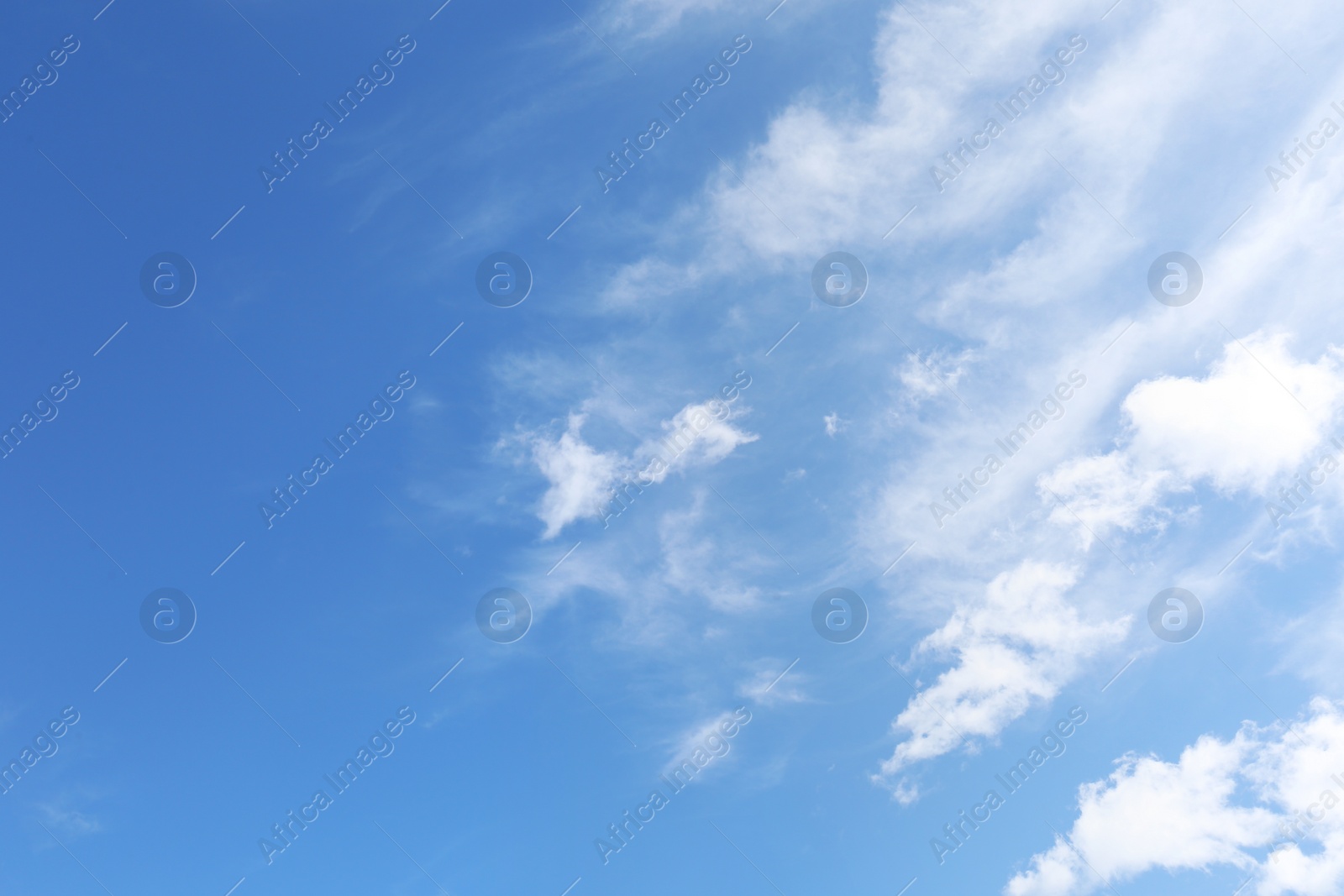 Photo of Picturesque blue sky with white clouds on sunny day