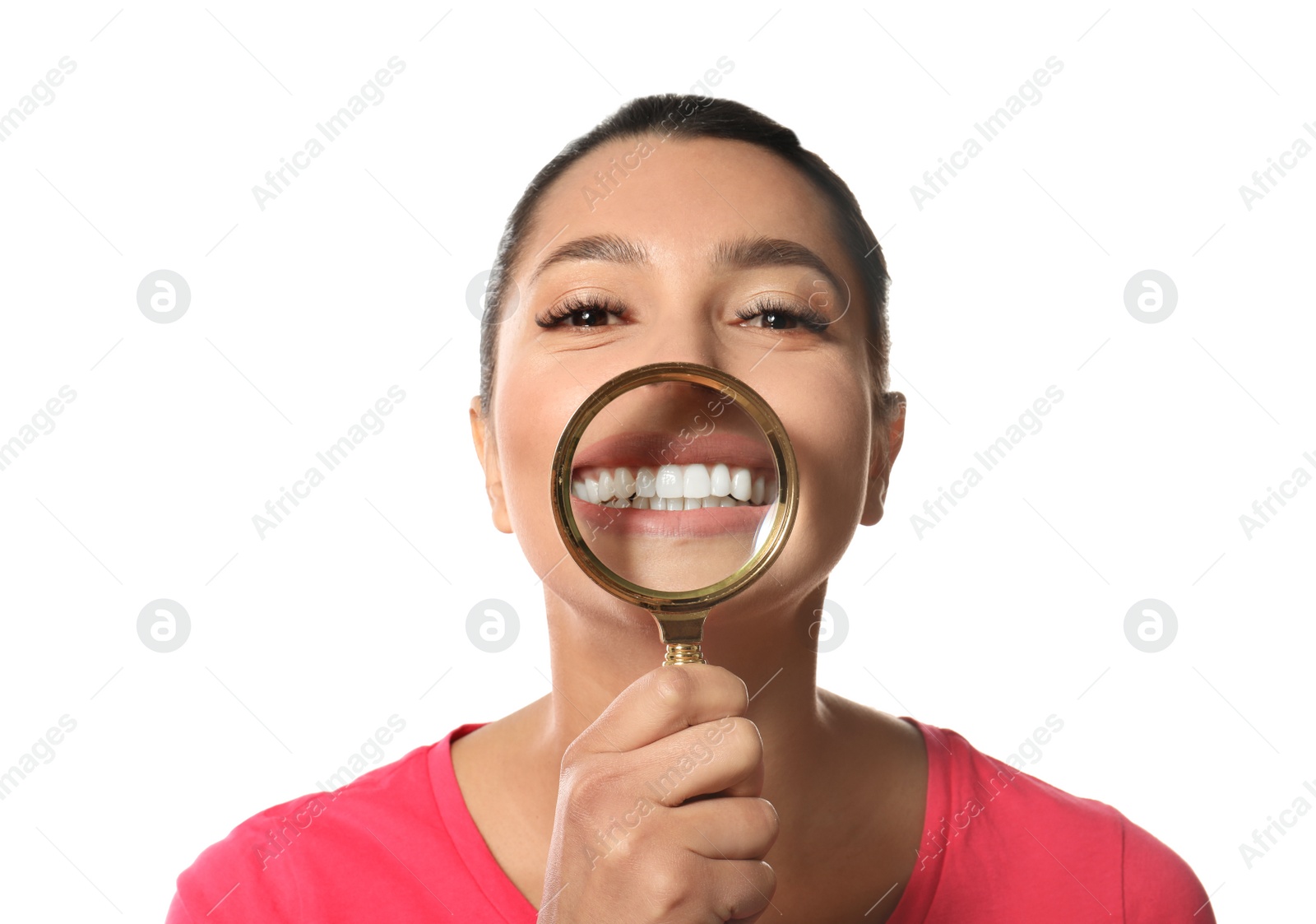 Photo of Young woman with healthy teeth and magnifier on white background