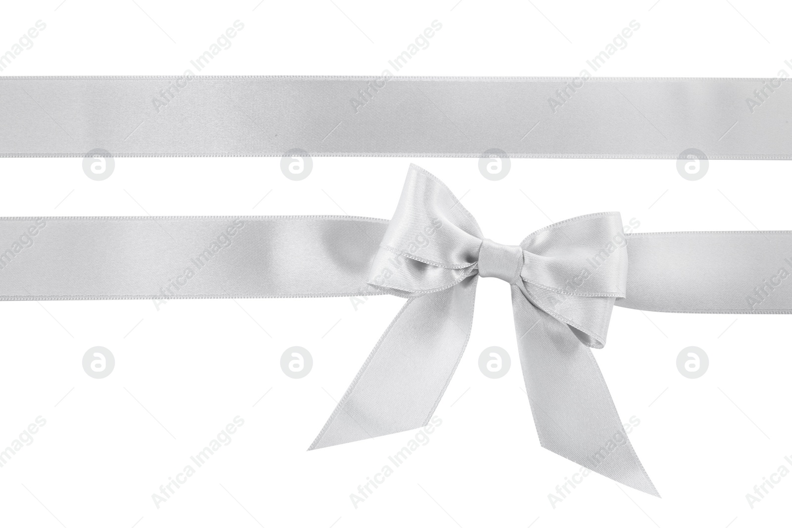 Photo of Silver satin ribbons with bow on white background, top view