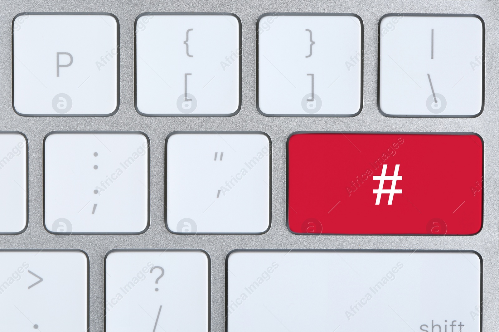 Image of Red button with hashtag sign on computer keyboard, top view